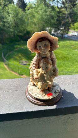 Capodimonte figurine by Giuseppe Armani from the Gulliver's World collection..