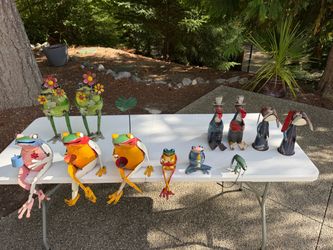 Whimsical frog and other garden animal sculptures