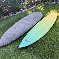 Rusty epoxy quad fin surfboard 7’