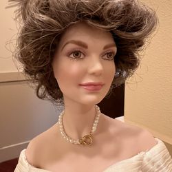 MCM Jacqueline Kennedy doll by Franklin hairloom dolls .