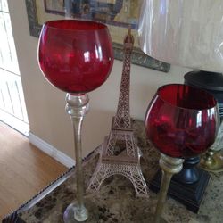 Eiffle Tower and tall red glass candle holder 