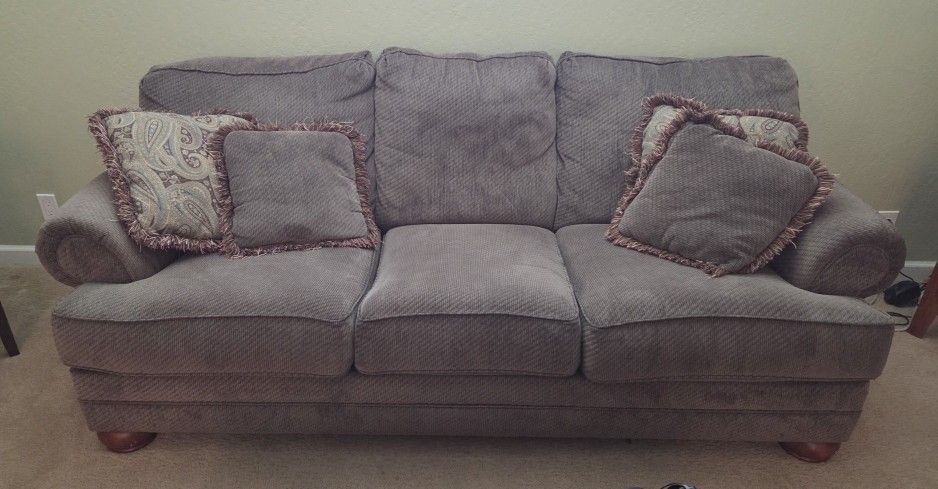 Green Couch And Loveseat With Pillows $25