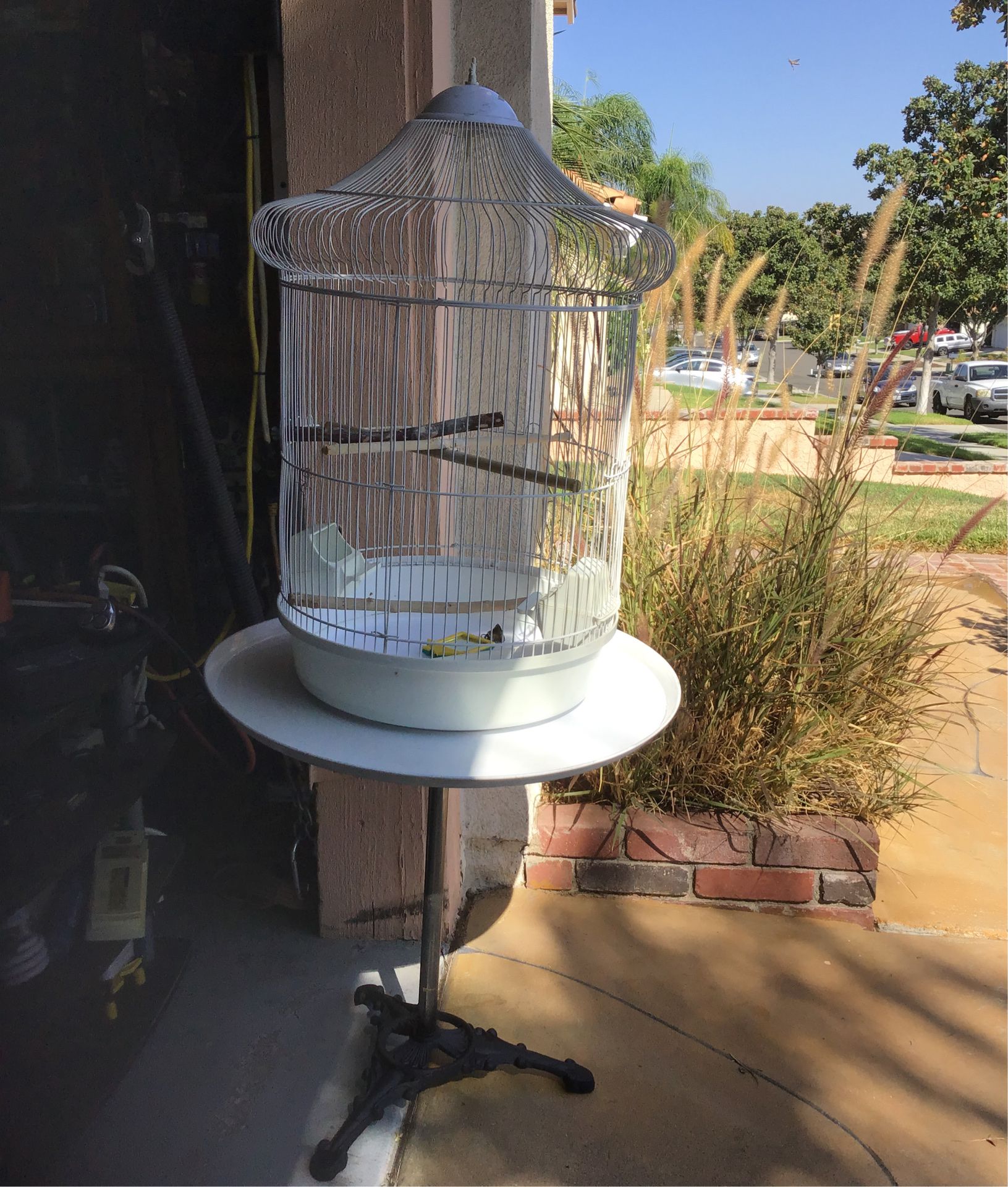 Bird cage with vintage metal stand