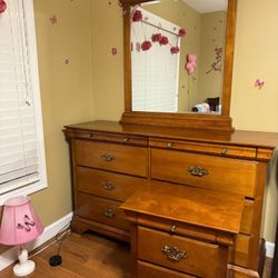 Solid wood 3Pc bedroom set: dresser, mirror, night stand. All tracks work well, no issues, great condition.  Dresser has 6 drawers plus 2 velvet lined