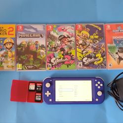 Blue Nintendo switch lite with 8 Nintendo switch games and charger tested
