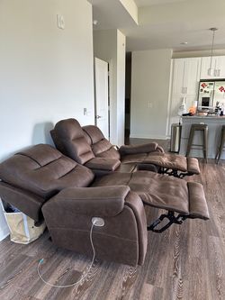Reclining leather couch built in charging stations
