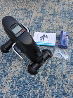 Mini Exercise Bike, Under Desk Bike Pedal Exerciser Portable Foot Cycle Arm & Leg Peddler Machine with LCD Screen Displays