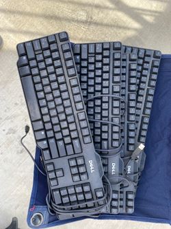 4 used dell usb keyboards