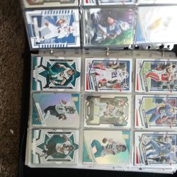 Binder With Assorted Baseball And Football Cards 