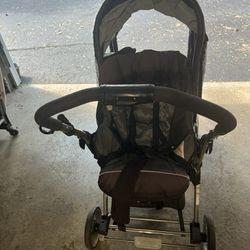 Used Graco double stroller with rain cover - Good condition 