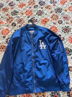 like new dodgers blue jacket with zipper on the side size XL