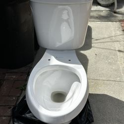 Glacier Bay High Efficiency Dual Flush Toilet - Used With Brand New Seat