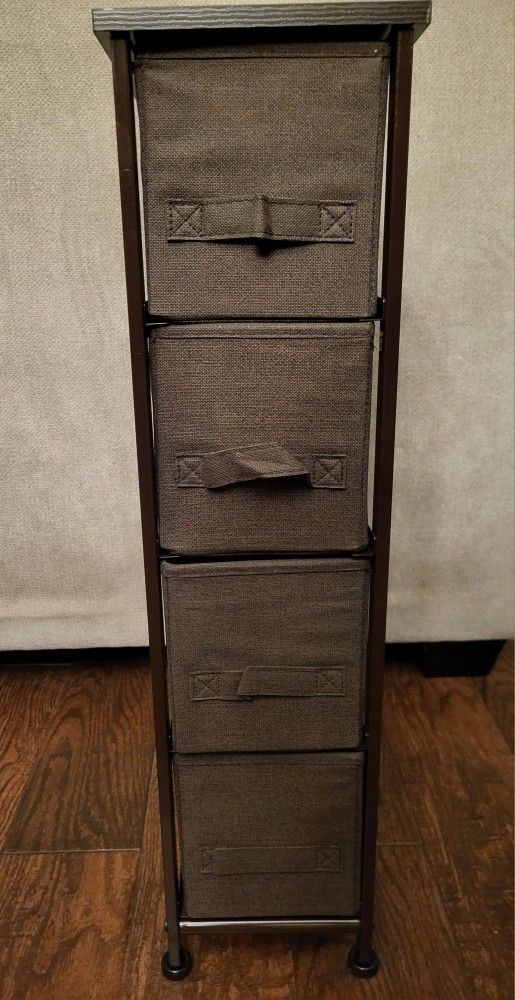 Narrow Dresser Storage Tower Stand With 4 Removable Fabric https://offerup.com/redirect/?o=RHJhd2Vycy5OZXc= Just Built. Sells For $35
