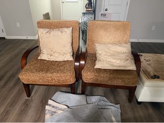 Two wooden comfortable chairs