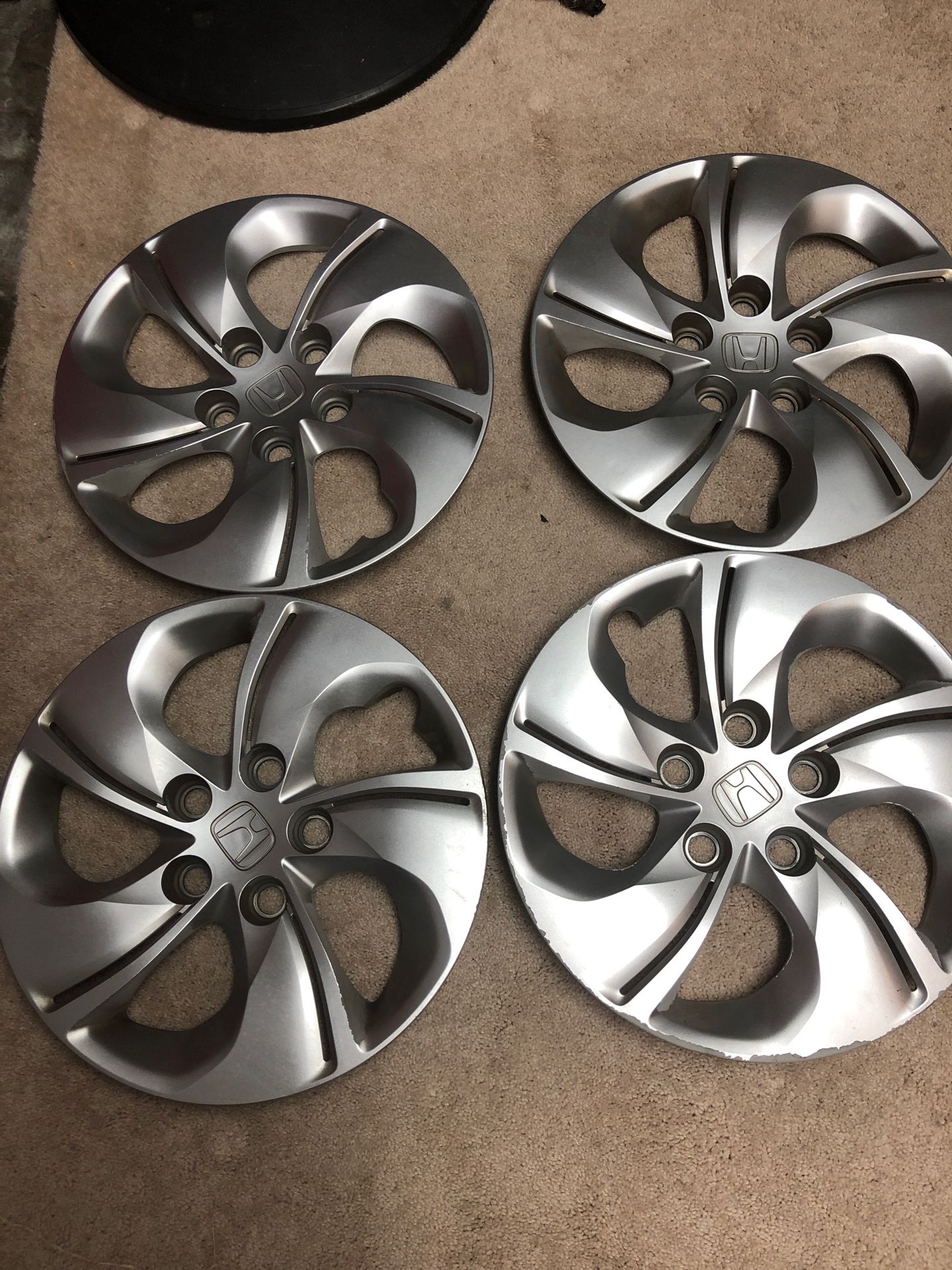 HONDA HUBCAPS 5 LUG. SLIGHTLY USED. BUT NICE