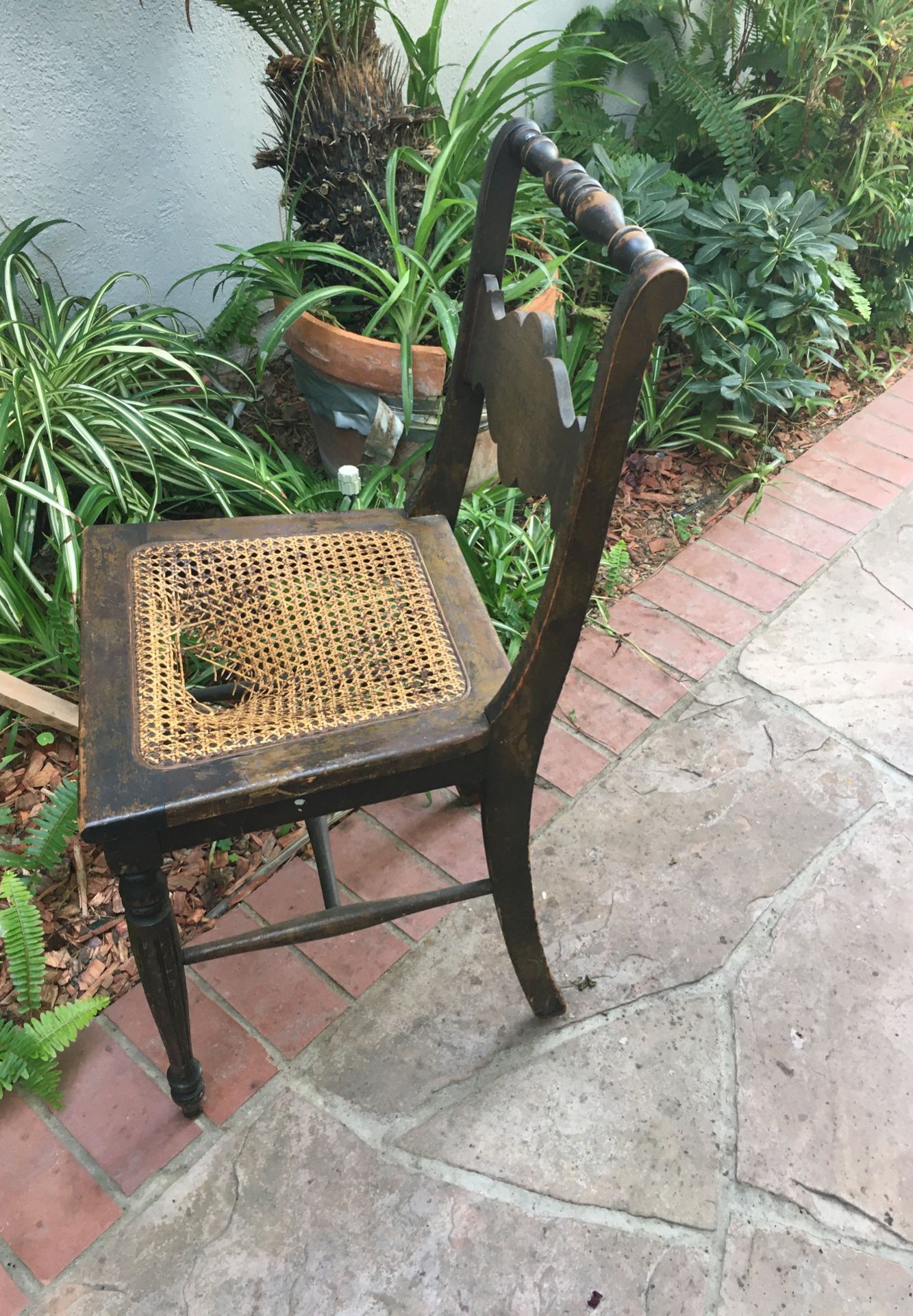 Antique wood/cane chair
