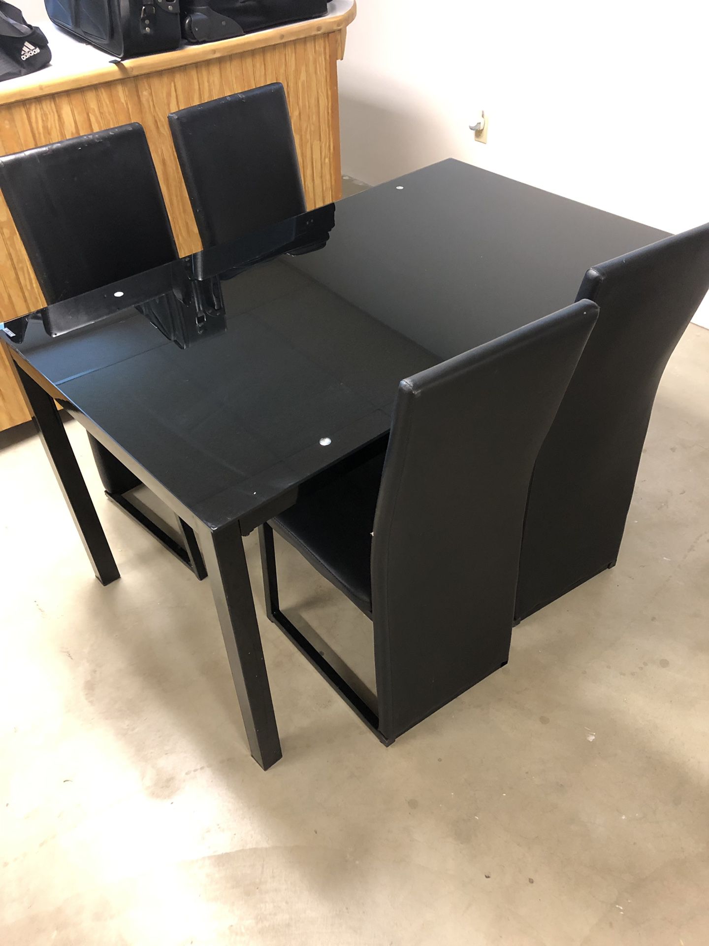 Black glass table and chairs