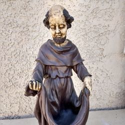 Monk Holding Robe $35.00