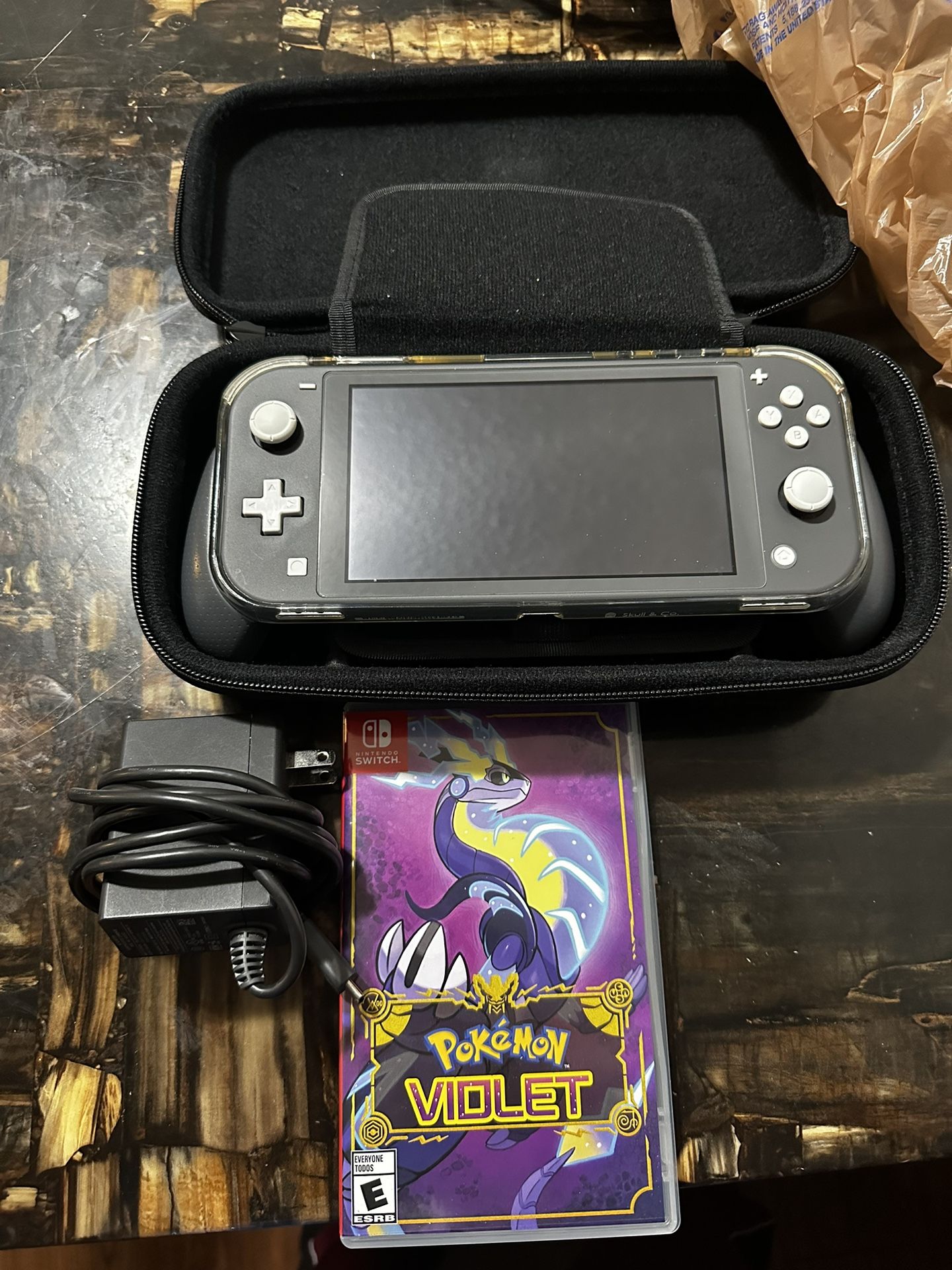 Nintendo Switch Lite Nuevo Viene Con Pokémon Violet Y Con Su