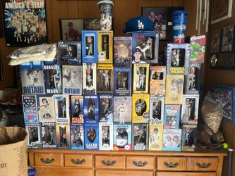 Dodger bobbleheads, trophy rings cup