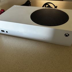 Xbox Series S And 1 Controllers 