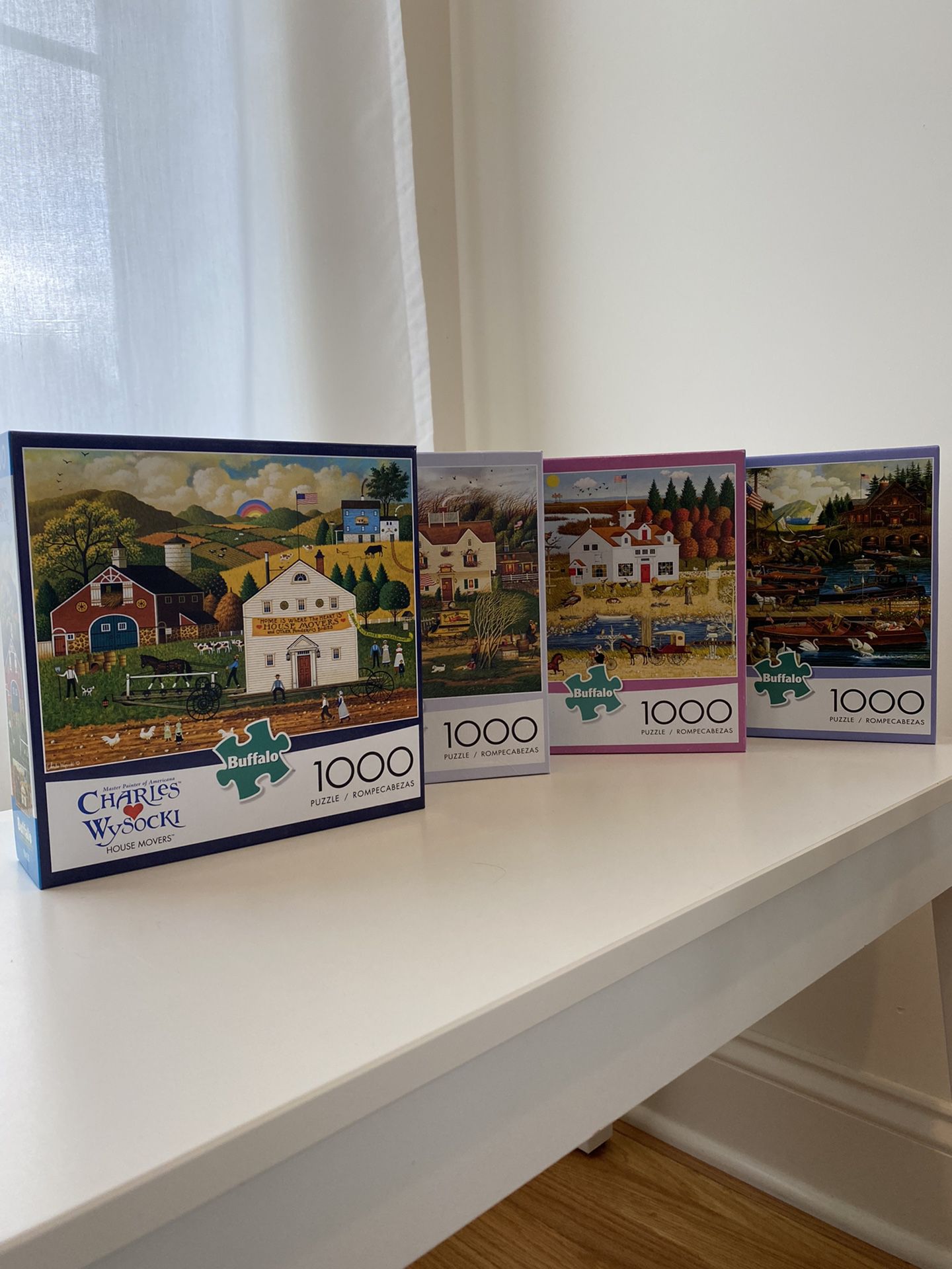1000 piece puzzles - bundle of four