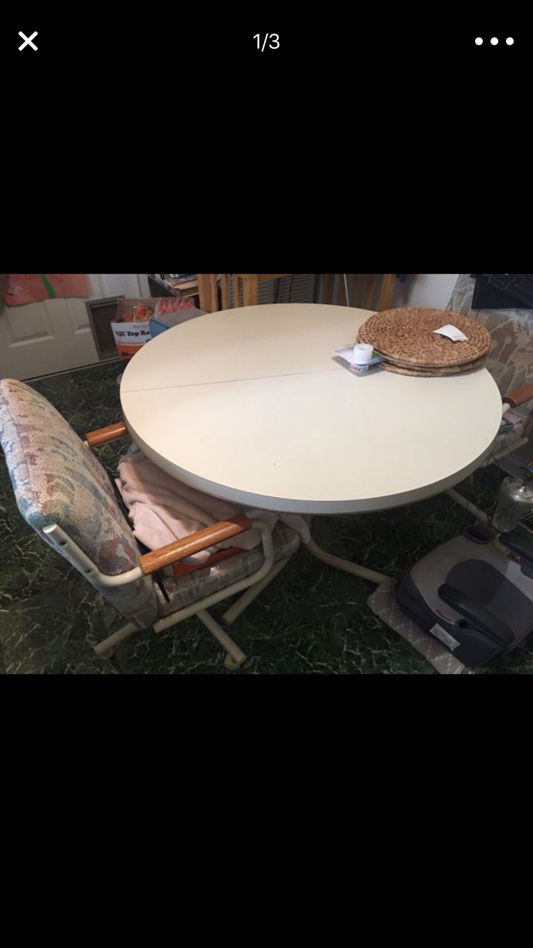 Kitchen table with 4 rolling chairs