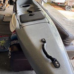 Kayak With Outriggers Raised seat Rod Holders