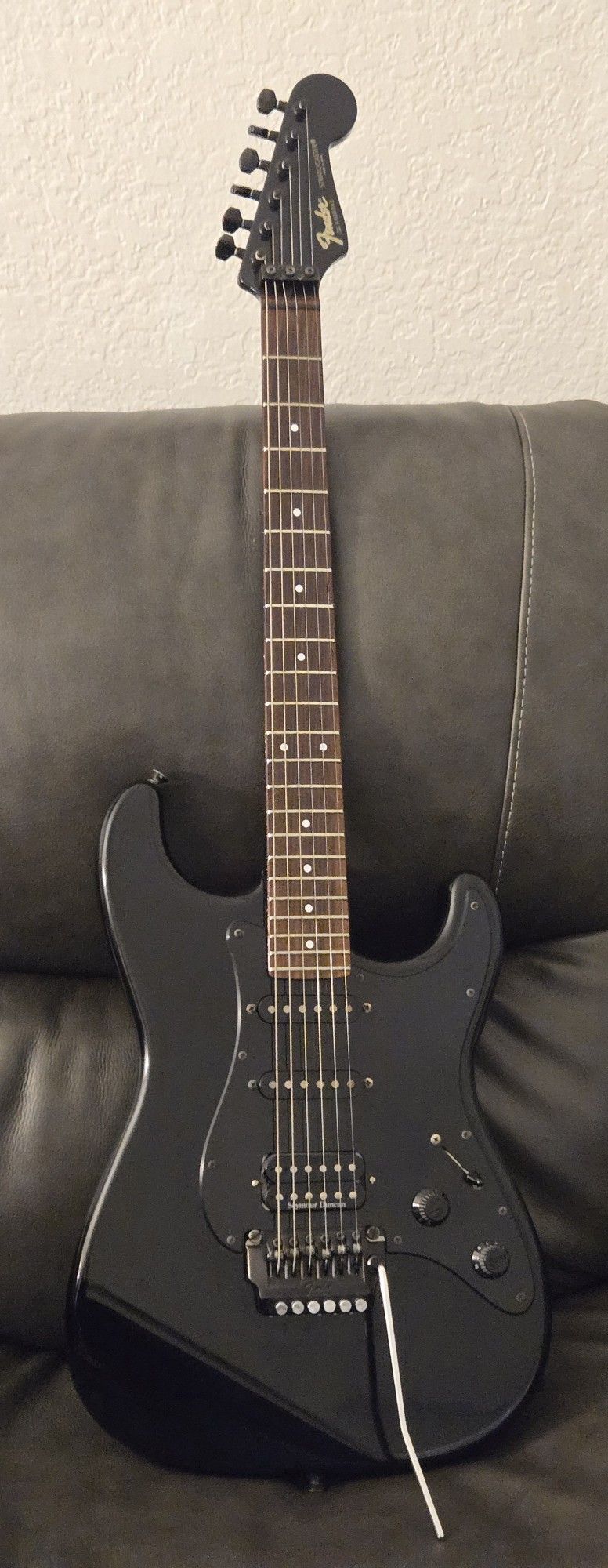 Collectible 1980s Japanese Made Fender Stratocaster Guitar (Black with rosewood fretboard)