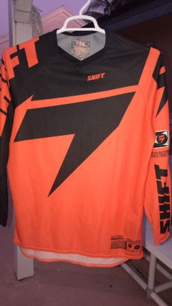 Orange and black shift motocross gear