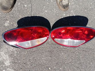 Jaguar XK8 tail lights (2002-2006) with lights bulbs and accessories oem.