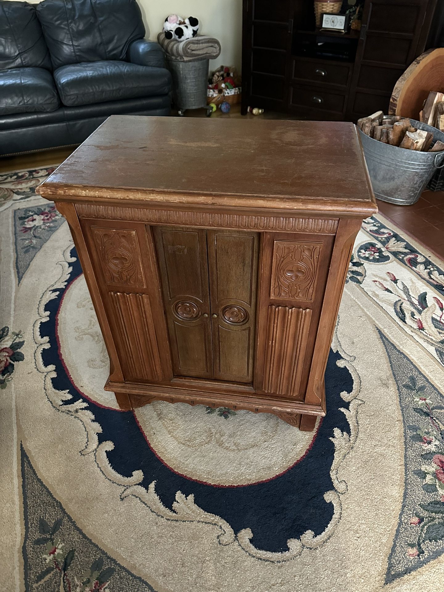 Carved Face Antique Cabinet