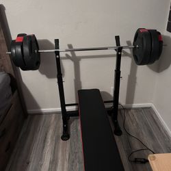 Weight Bench With bar and extra weights