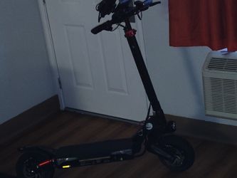 E- Scooter w/shock w/disc brakes