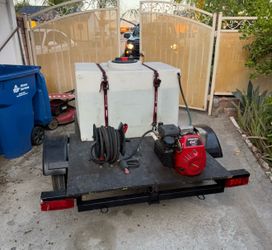 Trailer with pressure washer