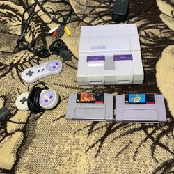 SUPERNINTENDO WITH 2 Games 2 Remotes