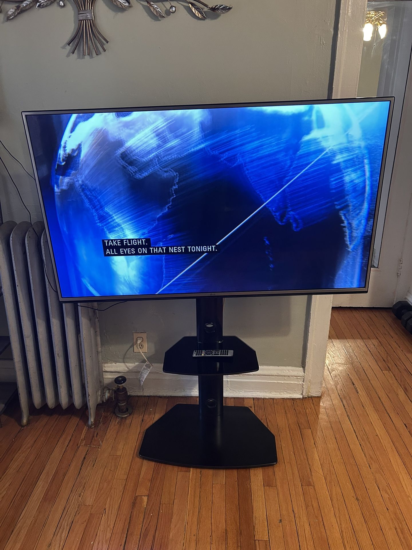 55” LG Flat Screen TV W/Stand And Remote