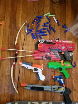 Nerf guns, some new, with extra darts.