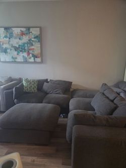 Large Gray Sectional Sofa with Ottomans