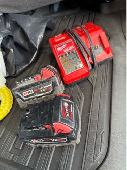 Milwaukee, batteries, and charger.