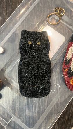 Beaded handmade antique glass case of wood chipper. These are a little loose on the back.