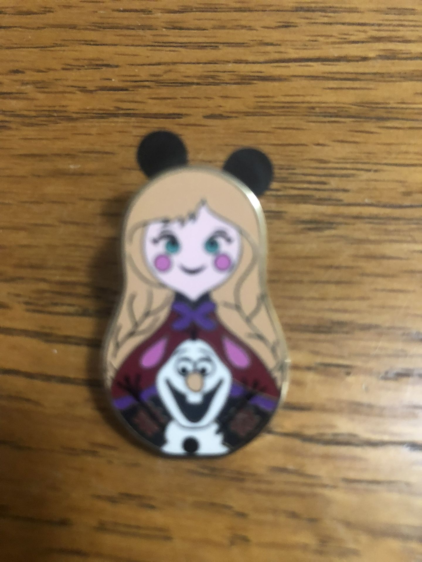 Toy Collectible Disney Nesting Dolls Collection Anna & Olaf Frozen Mystery Pin.  Size 3/4 inches wide and 1 1/4 inches long. Purchased at Disneyland.