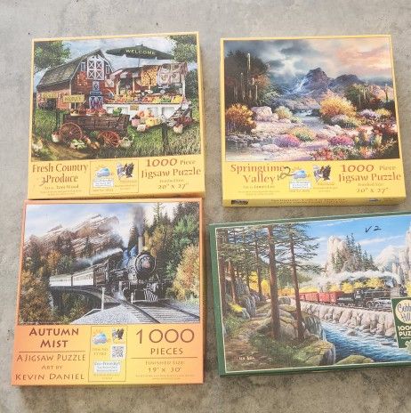 Four 1000 Piece Puzzles Complete