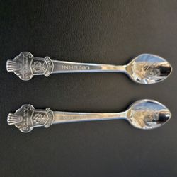 Bucherer of Switzerland souvenir decorative spoon featuring the Rolex brand logo