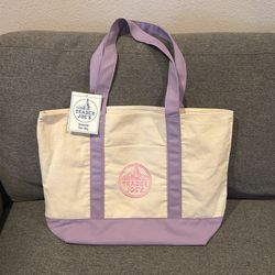 Full size Trader Joe’s reusable tote bag purple pastel pink logo released March 23