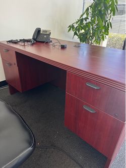 Desk with chair and phone