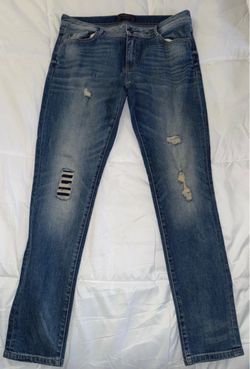 Distressed Blue Denim Jeans