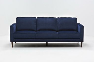 Blue velvet sofa with chaise