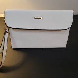 It's A very Clean  Bag  Its A Hand Bag.      Size  . 10'x  7"   .