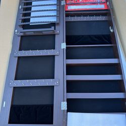 Wall cabinet with jewelry mirror